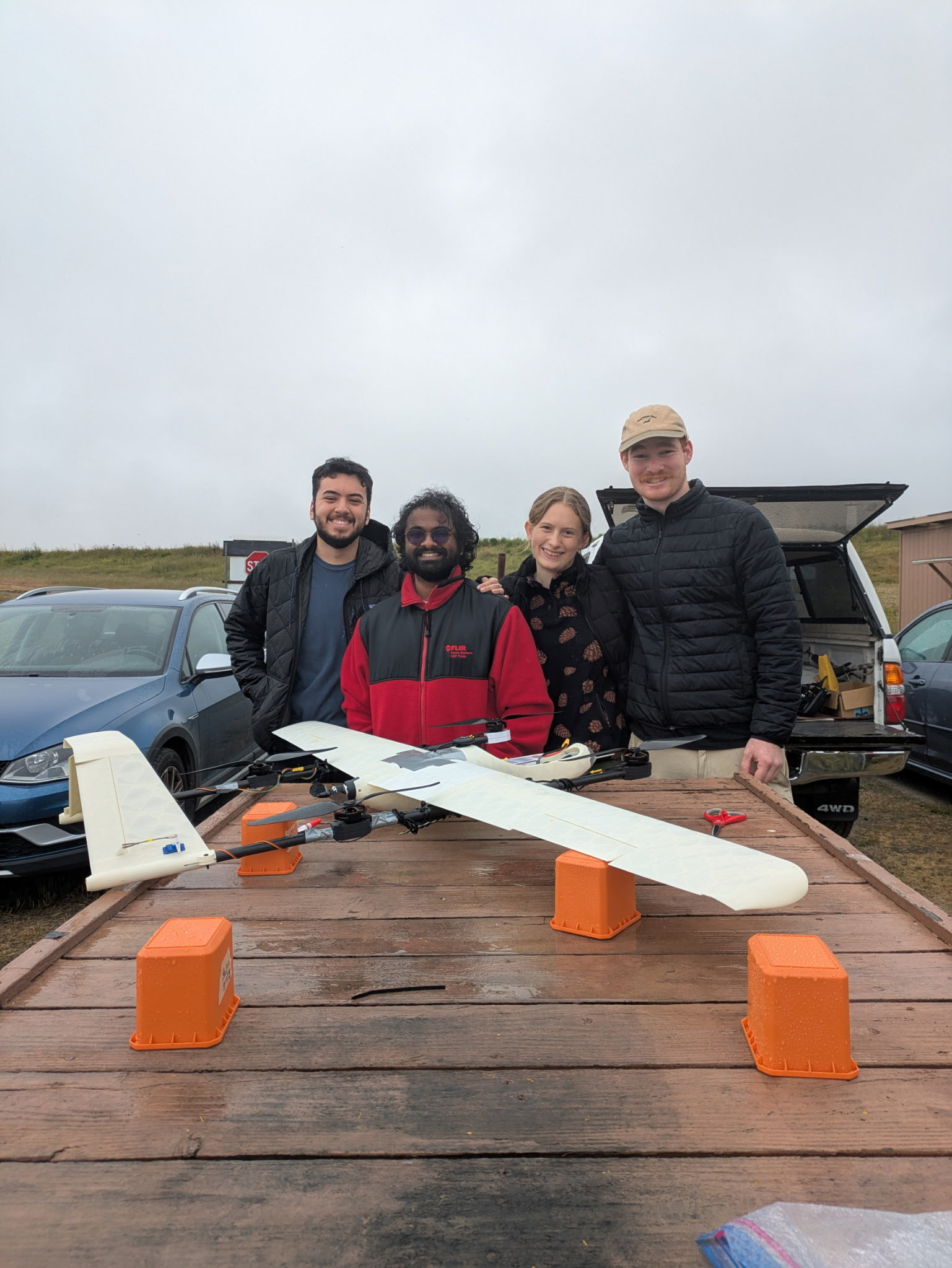 Team with a fixed-wing aircraft on a truck bed